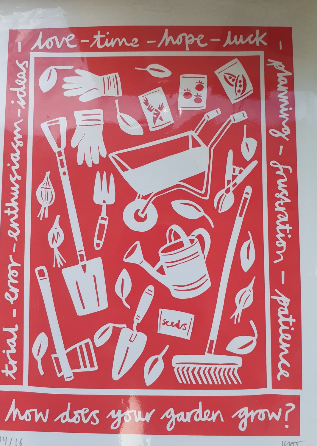Screen print in red and white of gardening tools, framed by the words love, time, hope, luck, planning, frustration, patience, trial, error, enthusiasm, ideas and the question How does your garden grow?